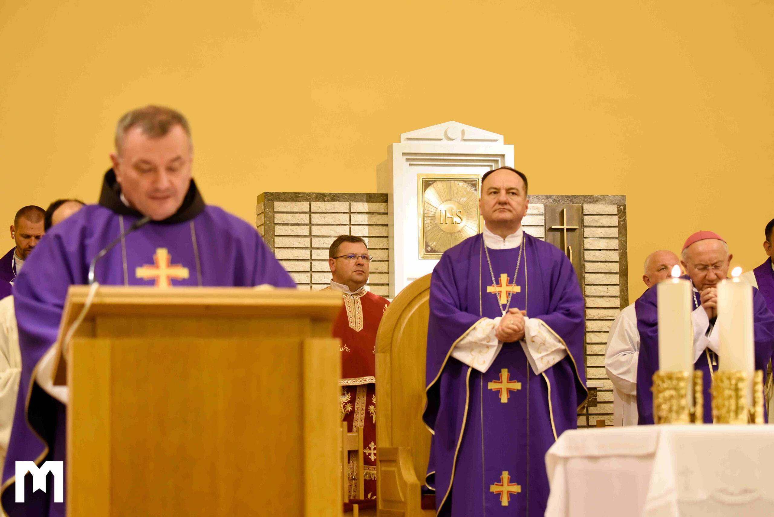 Bishop Palić and Fr. Danko Perutina in conversation